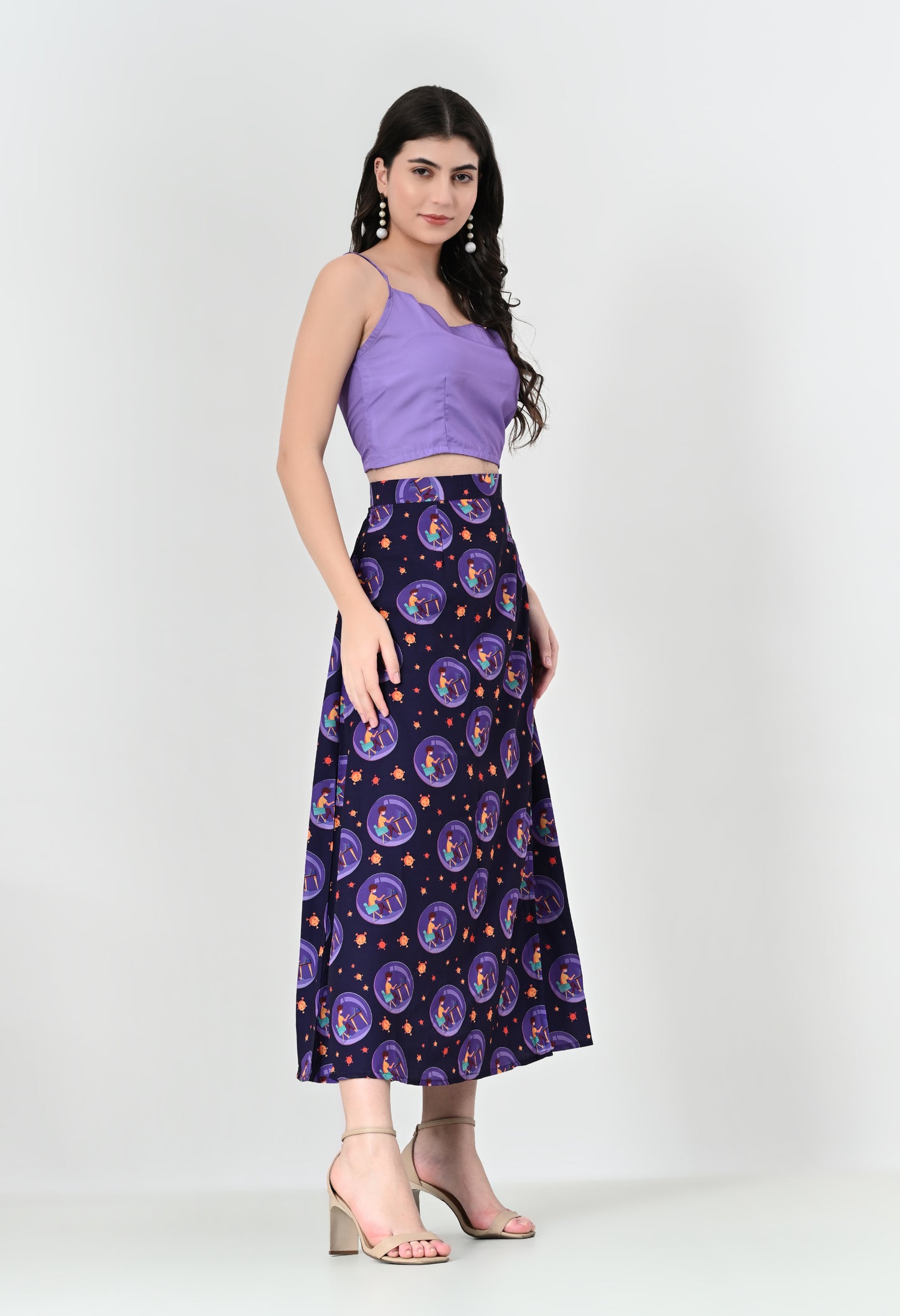 Trendy Two-Piece Crepe Outfit with Sleeveless Cropped Top and Patterned Long Skirt